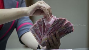 Susunan Kabinet Jokowi Bayangi Pergerakan Rupiah Awal Pekan Ini
