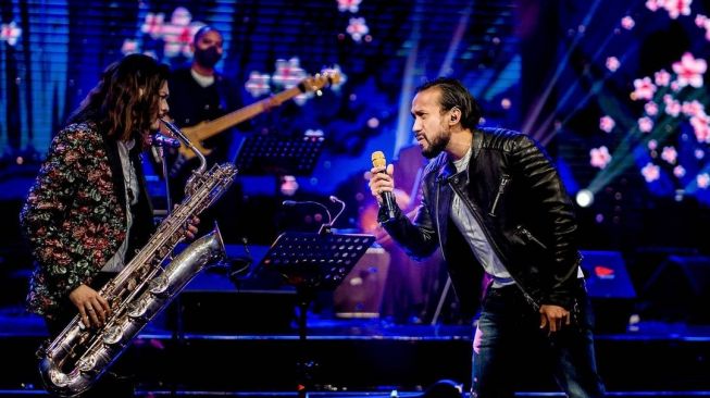 Lagu Natal Maruli Tampubolon Terpampang di Times Square New York